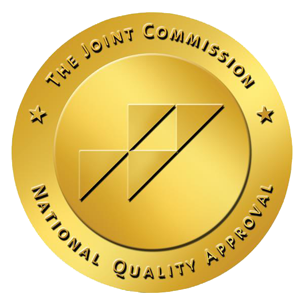 A gold seal that says the joint commission national quality approval.